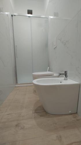 Ένα μπάνιο στο Turrignì Central Rooms