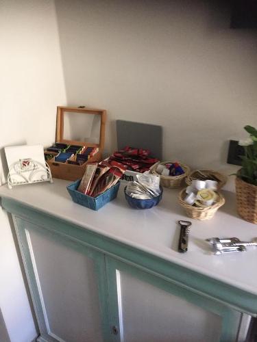 a counter top with baskets of items on it at La Rosa Dei Venti in Monterosso al Mare