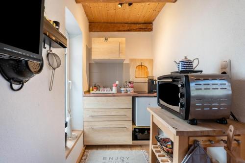 Kuchyň nebo kuchyňský kout v ubytování Bezauberndes Lütt Hus