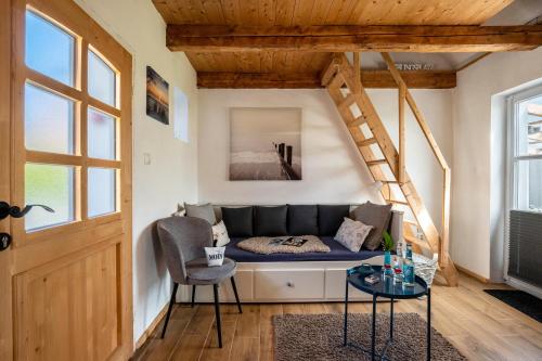 Posezení v ubytování Bezauberndes Lütt Hus