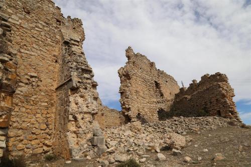 an old stone building on top of a hill at Hotel Rural Los Abriles in El Toro