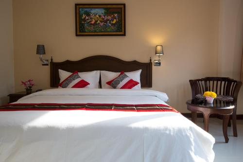 Cama o camas de una habitación en True Siam Rangnam Hotel