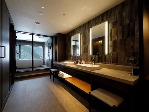 Ein Badezimmer in der Unterkunft Executive Suite SUIREI