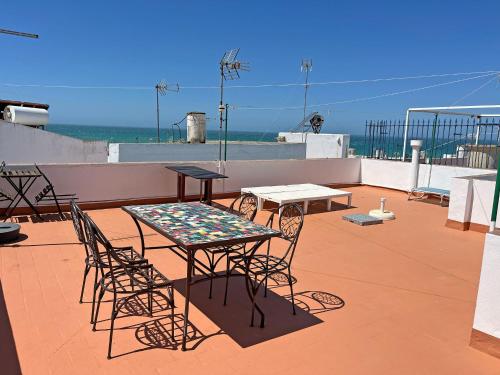 Sardinas apartment with roof terrace and sea view
