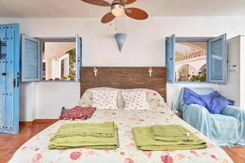 Postel nebo postele na pokoji v ubytování Cortijo Grande