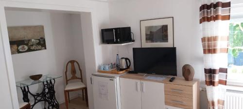 Televisyen dan/atau pusat hiburan di Schöne Wohnung in Arnsberg mit tollem Ausblick