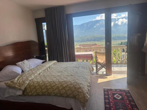 Postel nebo postele na pokoji v ubytování Guesthouse Mele