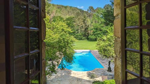 a view of a pool from a window at Bonfarto Locations in Urval