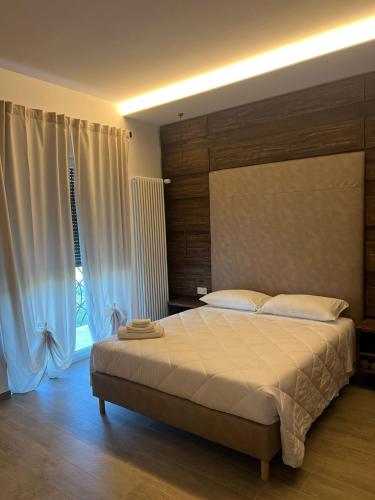 Ένα ή περισσότερα κρεβάτια σε δωμάτιο στο Bellavista Suite & Room