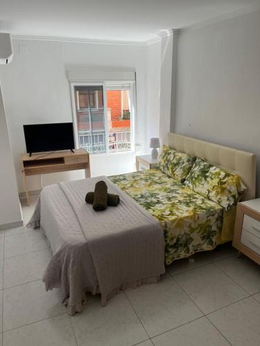 Letto o letti in una camera di San Jose Luminoso