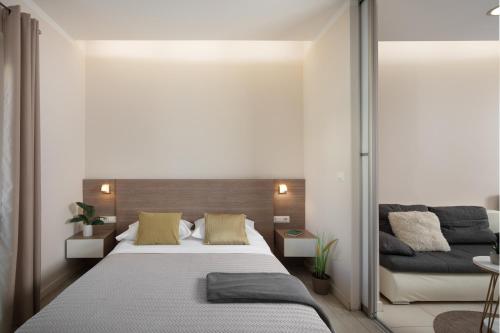 a bedroom with two beds and a mirror at Luxury 4 star apartment in the Old Town Zadar in Zadar