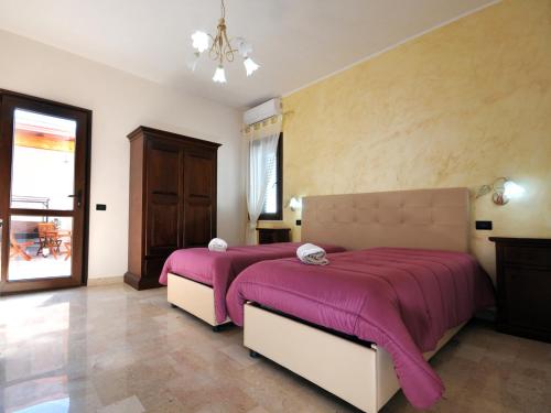 Postel nebo postele na pokoji v ubytování Il Calesse B&B