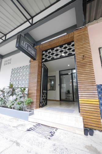 a building with a sign that reads ice house at Lee Home Bangkok in Bangkok