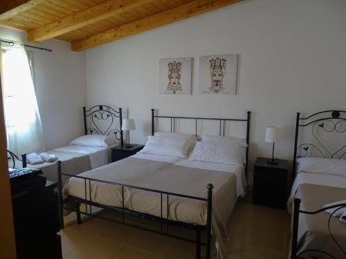 Posteľ alebo postele v izbe v ubytovaní B&B Villa Matari