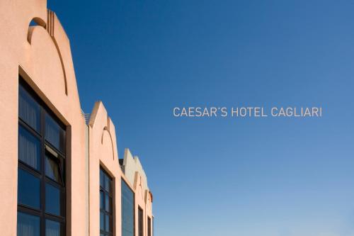 a view of the facade of a casars hotel cabaret at Caesar's Hotel in Cagliari