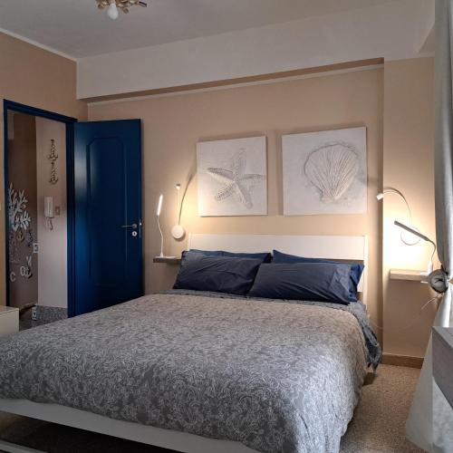 Ένα ή περισσότερα κρεβάτια σε δωμάτιο στο IL Ritratto casa vacanza