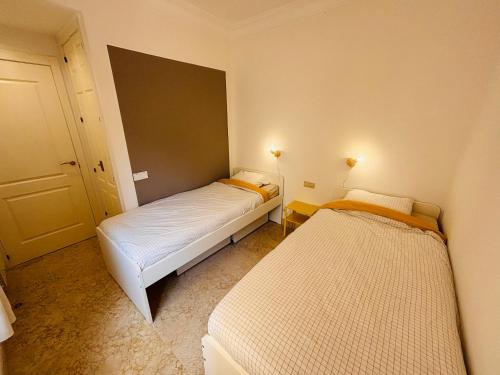Un ou plusieurs lits dans un hébergement de l'établissement La Cabaña Roda Golf Sol