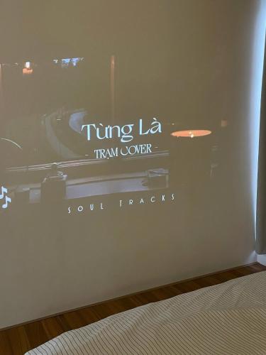 a window with a sign for a turing laser tramver at Adora Homestay Hue in Hue