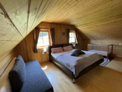 Postel nebo postele na pokoji v ubytování Ferienhaus Mörthandrä