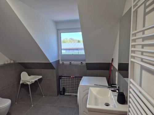 Koupelna v ubytování Gemütliche FeWo 4-6 Personen in Traumlage mit Sauna