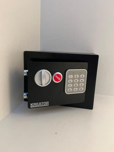 a black toaster with two buttons on a counter at Villa Evita - Sea View Apartment by Kostas in Afitos