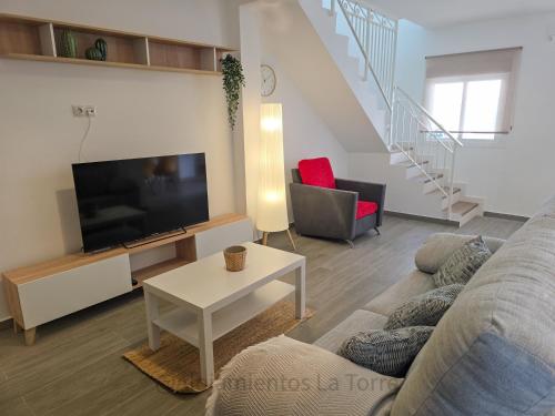 TV a/nebo společenská místnost v ubytování Casa Marenga - Alojamientos La Torre