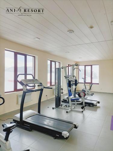 a gym with two treadmills and a treadmill at Ani Resort in Artavaz