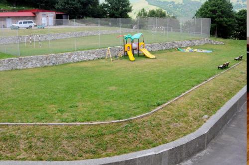 a park with a playground with a slide at Ani Resort in Artavaz