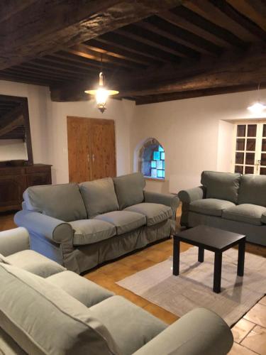 Ruang duduk di Le Haut des Lariers Gîte