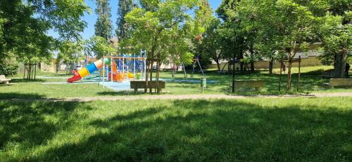 a park with a playground in the grass at Casa Elia in Ancona