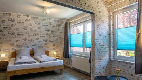 Postel nebo postele na pokoji v ubytování Ferienhaus Westerstraße