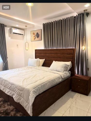 HavenHeight Residence tesisinde bir odada yatak veya yataklar