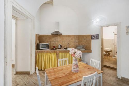 Kuchyň nebo kuchyňský kout v ubytování Aparthotel in pieno centro storico