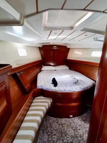a small bed in the back of a boat at Sailboat Holiday in Bodrum in Bodrum City