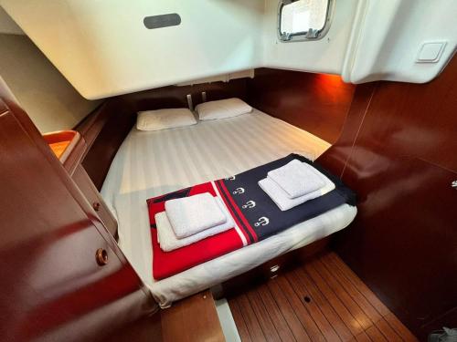 a small bed in the back of a boat at Sailboat Holiday in Bodrum in Bodrum City