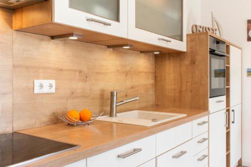 Kuchyň nebo kuchyňský kout v ubytování Ferienwohnung Windjammer