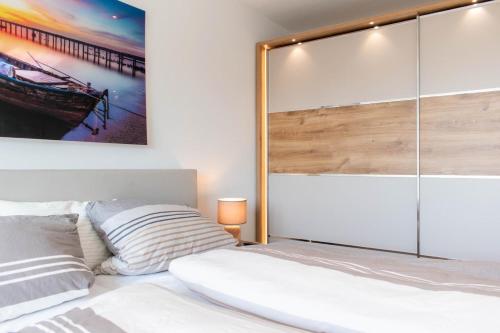 Postel nebo postele na pokoji v ubytování Ferienwohnung Windjammer