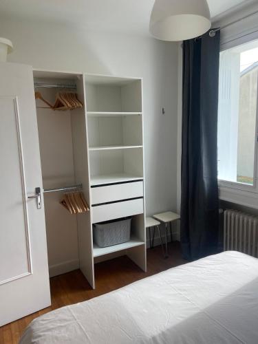 Ein Bett oder Betten in einem Zimmer der Unterkunft Gite de la Plaine