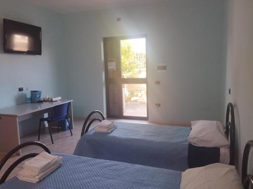 Ένα ή περισσότερα κρεβάτια σε δωμάτιο στο B & B green bay