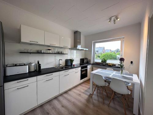 Η κουζίνα ή μικρή κουζίνα στο Ferienhaus Libelle