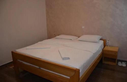 Postel nebo postele na pokoji v ubytování Hotel Biser