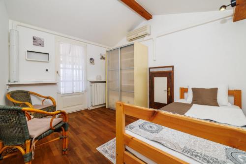 Ένα ή περισσότερα κρεβάτια σε δωμάτιο στο Bobbys Home