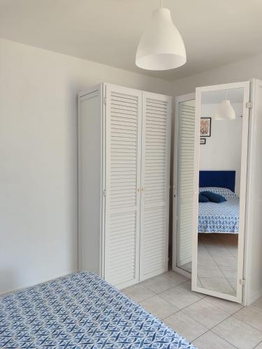 Letto o letti in una camera di Casa Francesca Ponza
