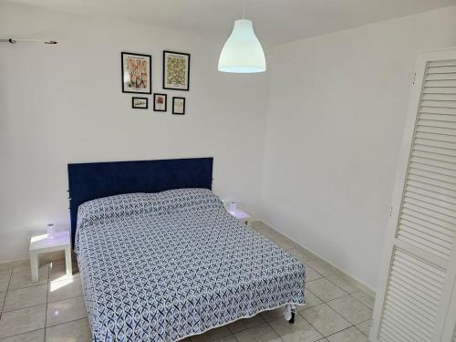 Letto o letti in una camera di Casa Francesca Ponza