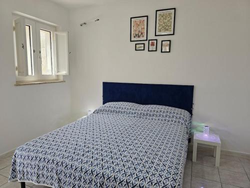 Letto o letti in una camera di Casa Francesca Ponza