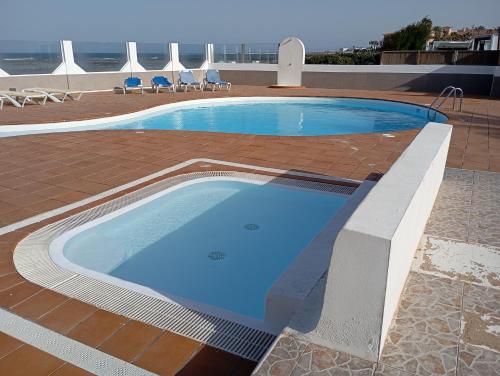 Geranio house, beachfront, pool, Corralejo