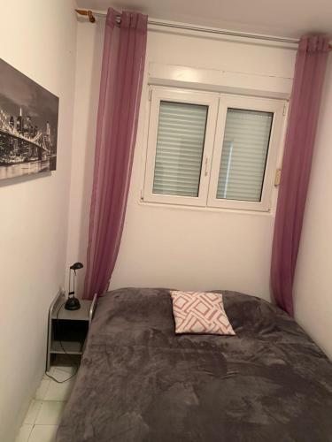 Postel nebo postele na pokoji v ubytování Apartment Milly