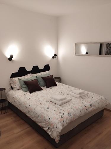 Ένα ή περισσότερα κρεβάτια σε δωμάτιο στο Apartmani Venium