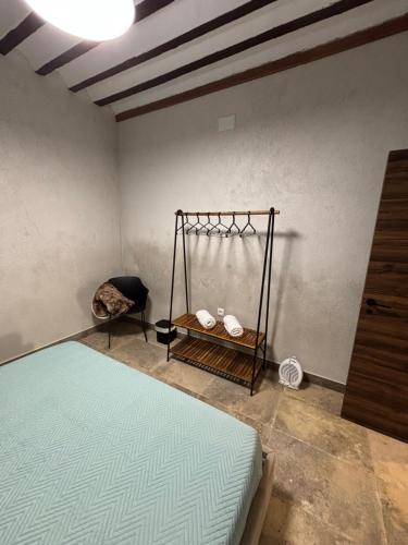 a bedroom with a bed in a room at La Morada del Conde in Manzanares