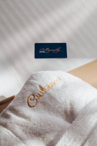 Katil atau katil-katil dalam bilik di Boutique Hotel Calligraphy